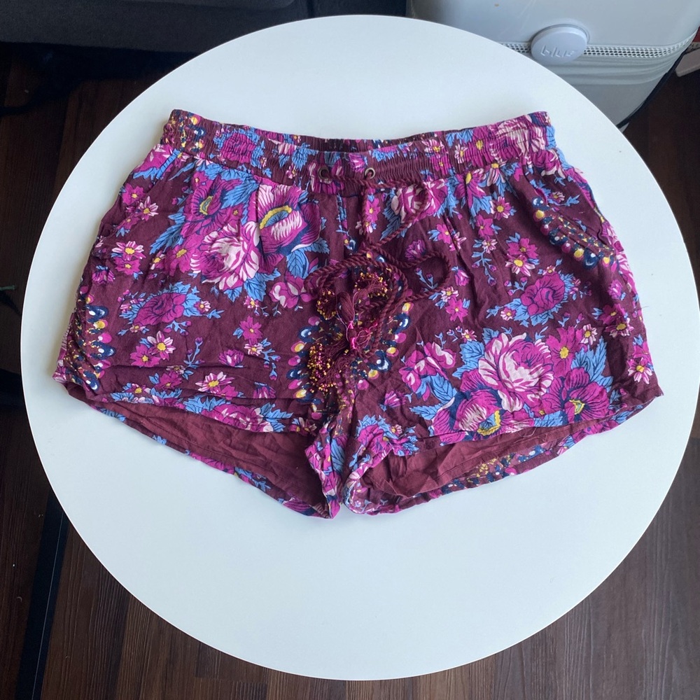Francesca’s Floral Flowy Shorts with Tassles